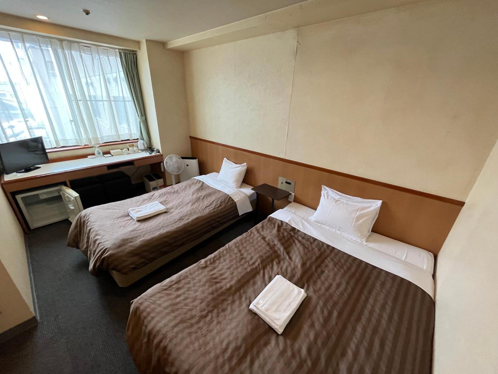 Hotel Axia Inn Куширо Екстериор снимка