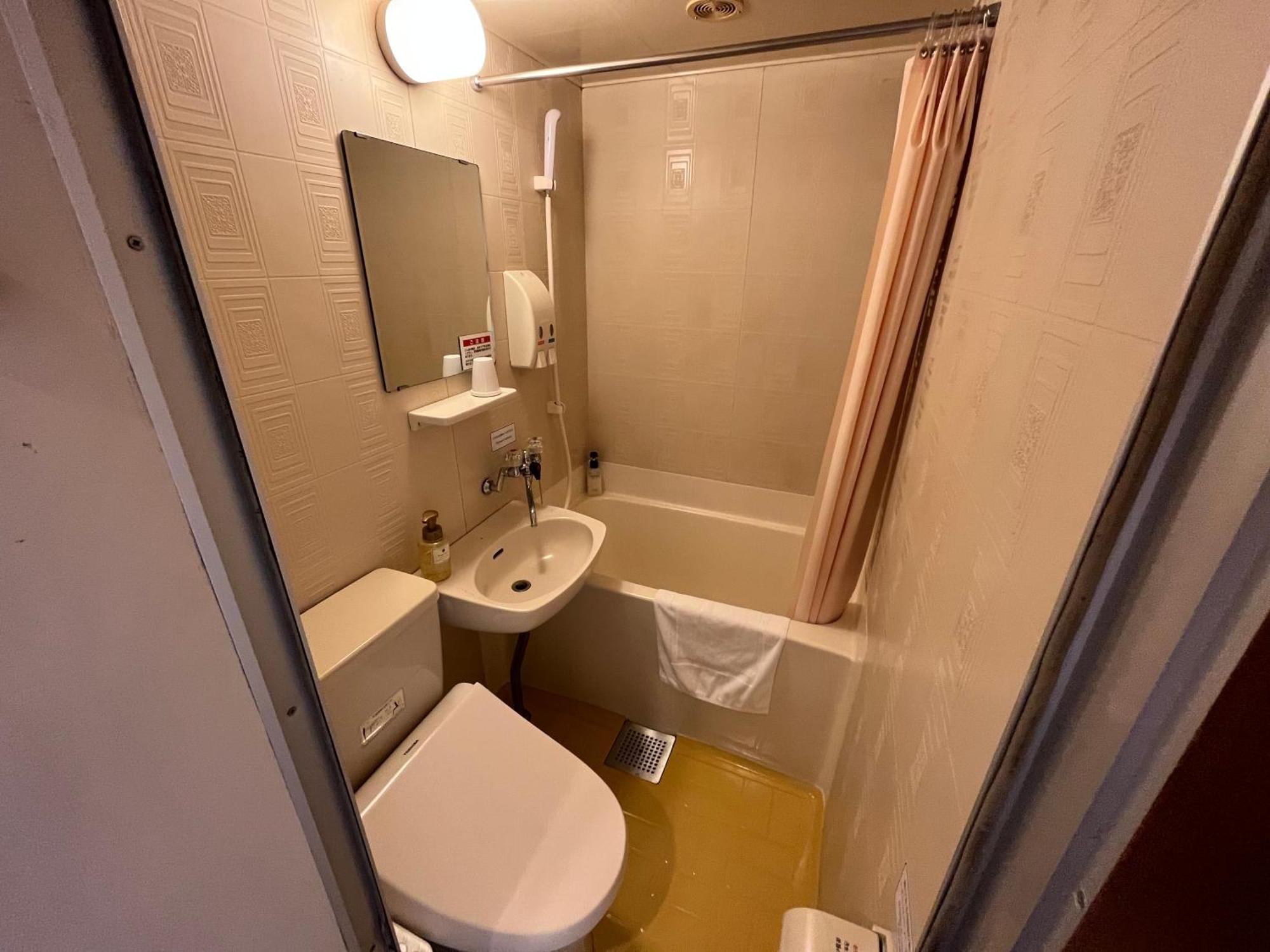Hotel Axia Inn Куширо Екстериор снимка