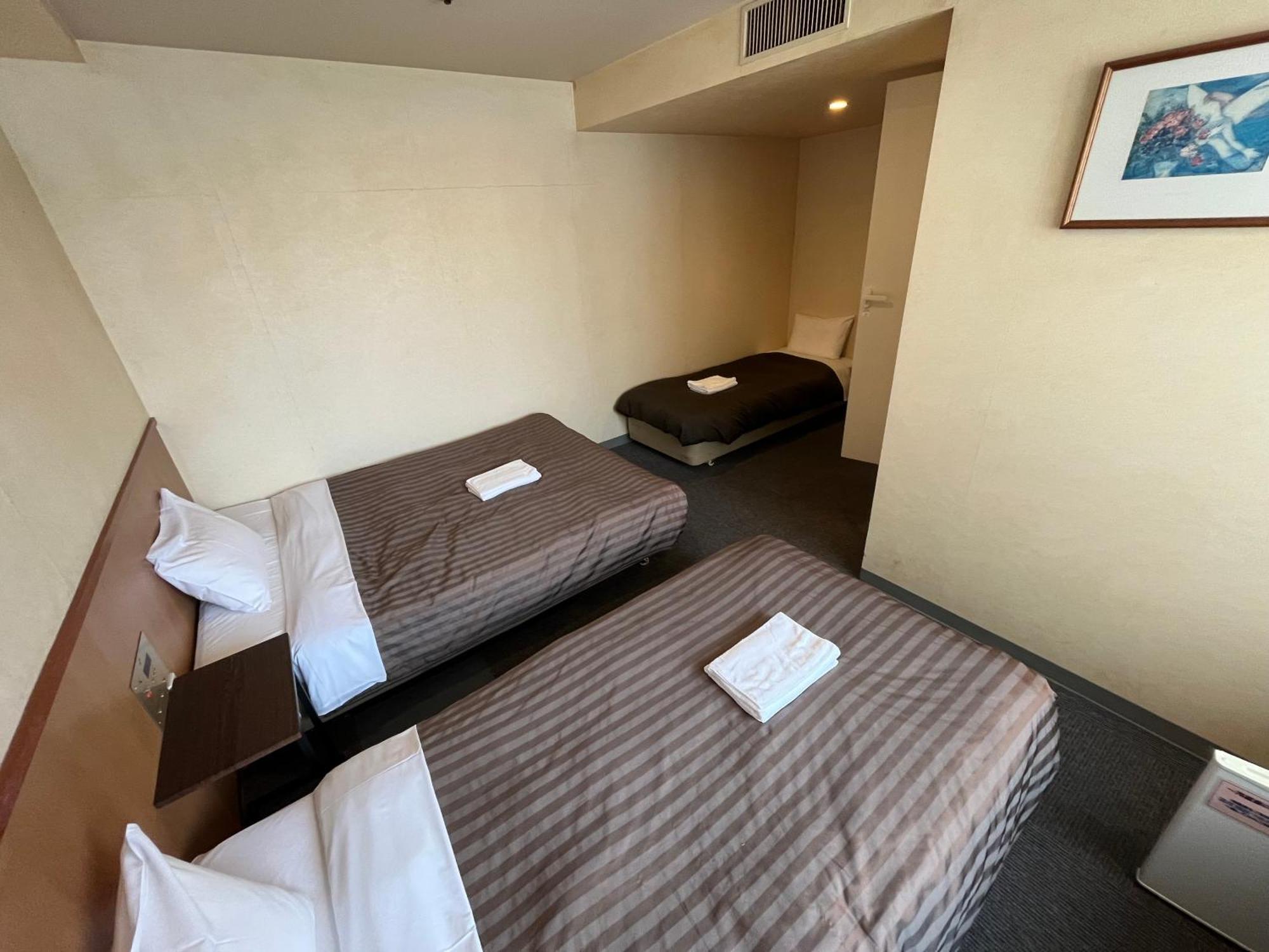 Hotel Axia Inn Куширо Екстериор снимка