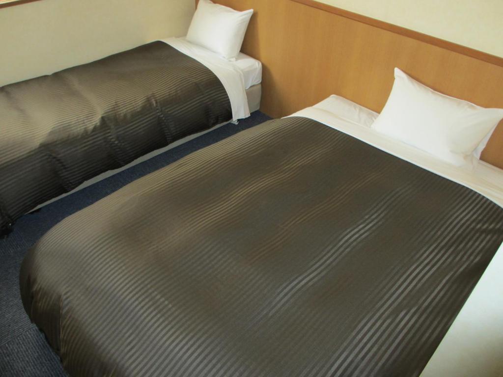Hotel Axia Inn Куширо Стая снимка