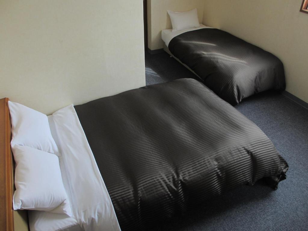 Hotel Axia Inn Куширо Стая снимка
