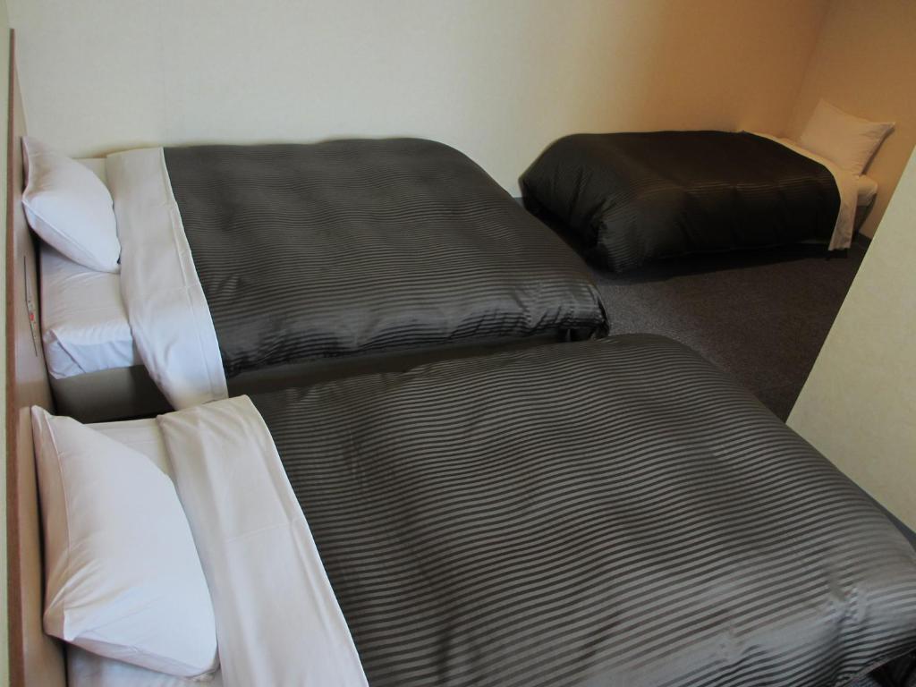 Hotel Axia Inn Куширо Стая снимка