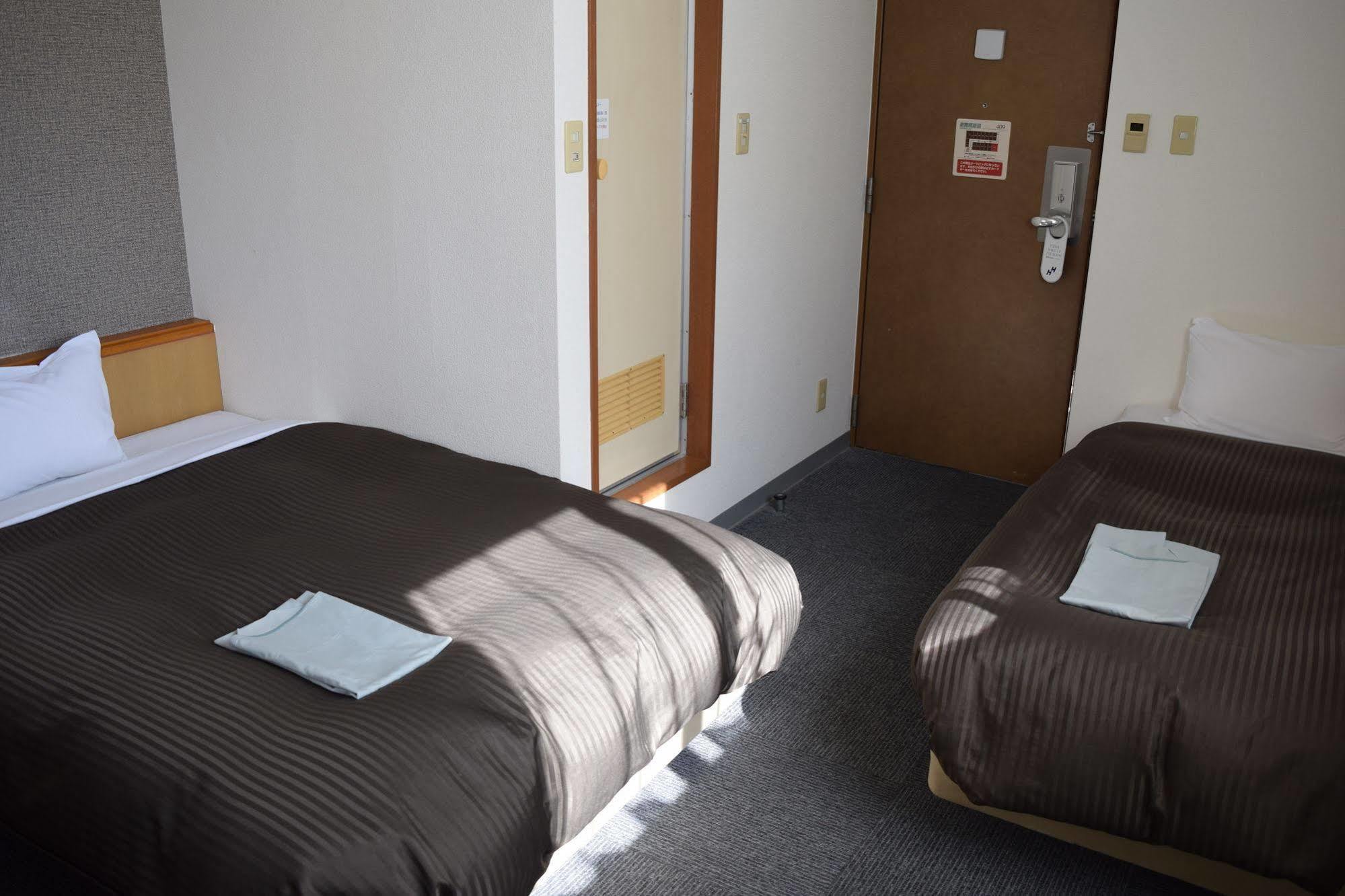Hotel Axia Inn Куширо Екстериор снимка